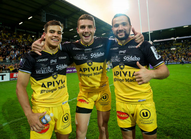 Thomas Berjon, Maxime Lafage and Alexi Bales celebrate after the game.