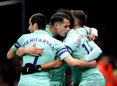 Arsenal players celebrate a goal.