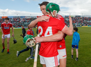 Alan Cadogan (24) with Aidan Walsh after yesterday's game.