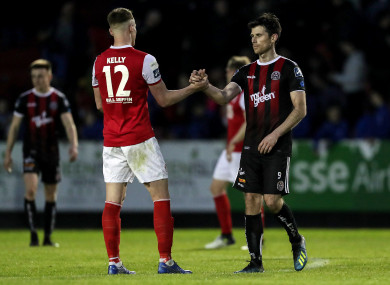 St. Patrick's Athletic's Ciaran Kelly shakes hands with Bohemians' Dinny Corcoran after the game.