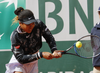 Japan's Naomi Osaka battled back from the brink to avoid defeat at the French Open.