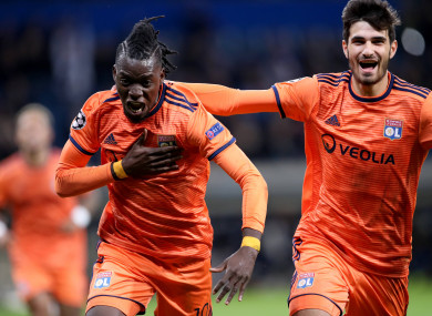 Lyon players celebrate.