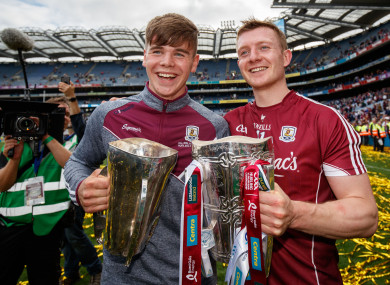 Joe and Jack Canning after Galway's famous All-Ireland double in 2017.