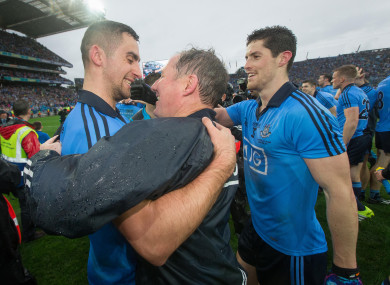 Jim Gavin celebrates the 2015 All-Ireland with James McCarthy and Rory O'Carroll.