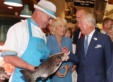 Pat O'Connell, a fishmonger at the English Market in Cork, meeting Prince Charles and Camilla last year.