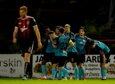 Sligo Rovers' players celebrate Parkes winning goal at Dalymount Park.