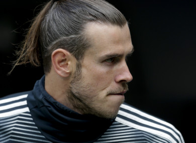 Gareth Bale watches from the bench during Real Madrid's defeat to Real Betis this afternoon.