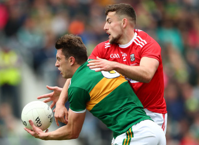 Cork's Nathan Walsh and Kerry's David Moran.