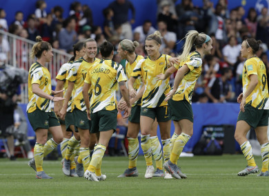Australia players celebrate.