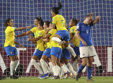 Marta celebrates with her team-mates after becoming the top scorer in World Cup history.