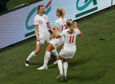 England's Ellen White celebrates scoring her side's first goal.