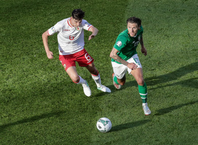 Ireland's Jeff Hendrick and Louie Annesley of Gibraltar.