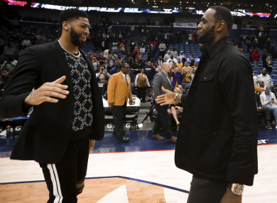 New Orleans Pelicans forward Anthony Davis meets with Los Angeles Lakers forward LeBron James.