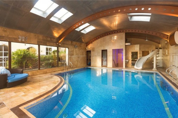 4 Of A Kind Make A Splash In These Luxury Homes With Their Own Pools