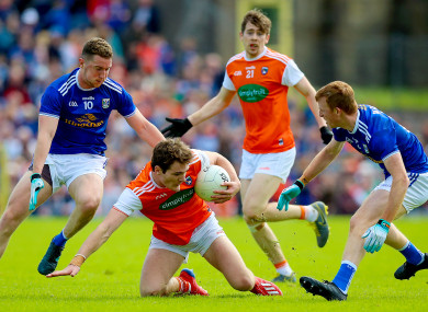 Jarlath Og Burns (centre) in the thick of the action yesterday.