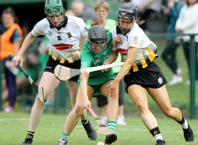 Denise Gaule and Katie Power tackle Mairead Ryan.