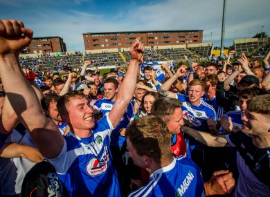 Laois players celebrate after their victory over Dublin.
