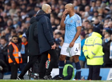Manchester City manager Pep Guardiola (left) and former club captain, Vincent Kompany.