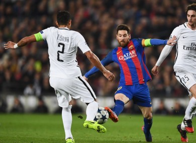 Lionel Messi pictured competing against Thiago Silva.
