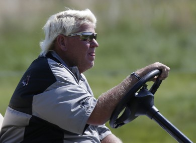 Daly drives the cart allowed at the recent USPGA Championship in New York.