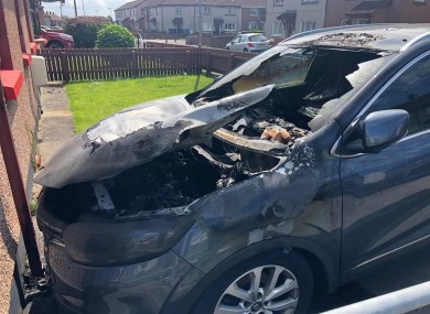 The damage caused to the Sinn Féin activist's car.