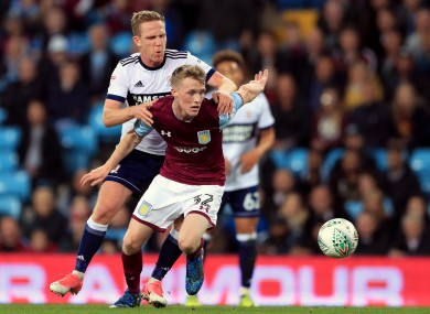 Jake Doyle-Hayes of Aston Villa tangling with Middlesbrough's Adam Forshaw during a Carabao Cup fixture in September 2017.