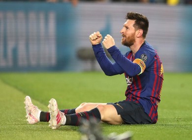Lionel Messi celebrates his stunning free-kick against Liverpool in last season's Champions League.