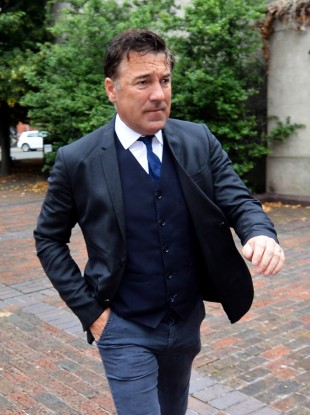 Ex-Premier League footballer Dean Saunders arrives at Chester Magistrates' Court.