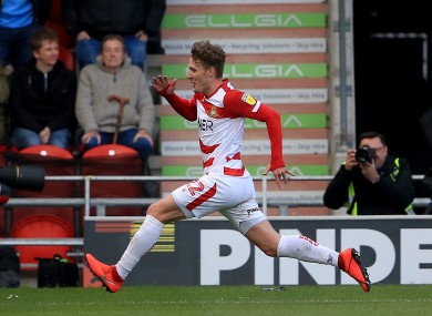 Sadlier celebrates scoring for Doncaster Rovers.