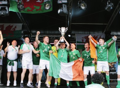 The Irish team celebrate with the Glyndwr Cup.