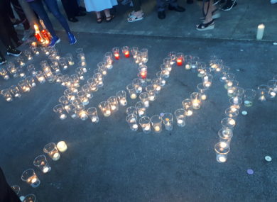 Candles laid by locals during last week's vigil.