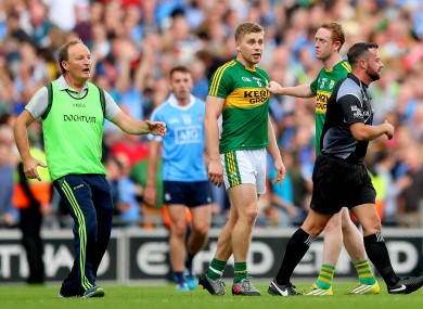 Kerry players Peter Crowley and Colm Cooper with referee David Gough after the 2017 All-Ireland final.