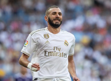 Karim Benzema reacts after a missed chance.