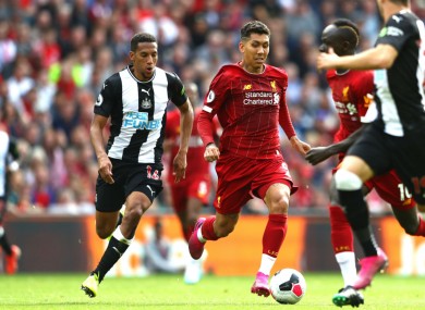 Roberto Firmino in action against Newcastle United