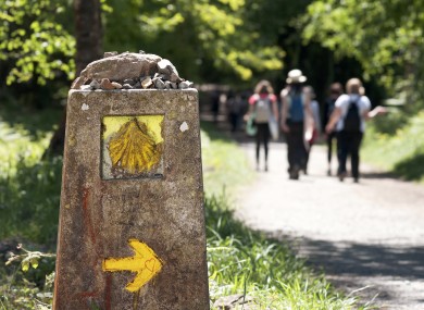 The yellow scallop shell signs the way to Santiago de Compostela on the St James pilgrimage route.