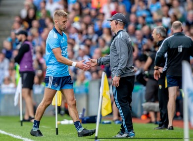 Jonny Cooper with Jim Gavin after being shown a red card.