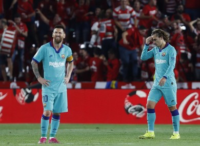 Lionel Messi and Antoine Griezmann dejected.