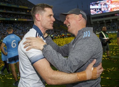 Stephen Cluxton celebrates with Jim Gavin after the game.