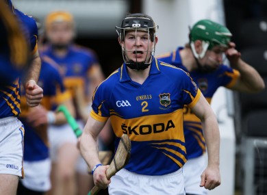 Donagh Maher running onto the pitch for Tipperary in 2012.