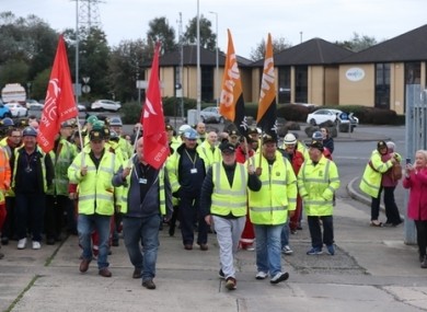 Workers return to the Harland and Wolff shipyard after a buyer was found to save the Belfast shipmakers.