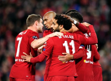 Salah celebrates scoring his second goal on Wednesday night at Anfield.