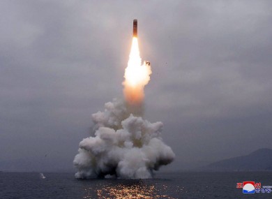 An underwater-launched missile lifts off in the waters off North Korea's eastern coastal town of Wonsan. Photo provided by the North Korean government.