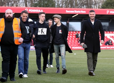 Harvey Neville (third from left) with Dad Phil, Romeo Beckham and David Beckham at a recent Salford City game.