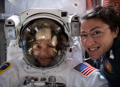 NASA astronauts Christina Koch (right) and fellow Expedition 61 Flight Engineer Jessica Meir