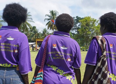 Bougainville residents wearing t-shirts promoting a peaceful referendum.