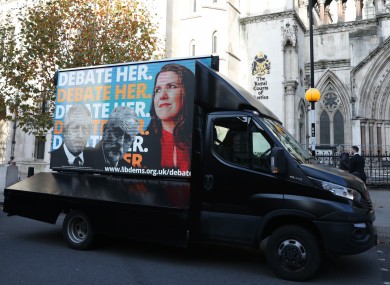 The Lib Dems' Debate Her billboard outside the Royal Courts of Justice.
