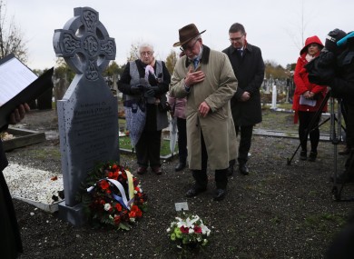 Liam Dinneen, from Skerries, at the grave of his grand uncle Patrick OÕDowd, during a ceremony at Glasnevin cemetery.