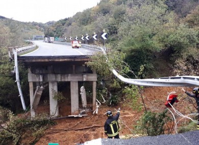 A 100ft section of road along a viaduct near the flooded Italian coastal city of Savona collapsed on Sunday