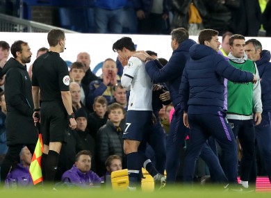 An emotional Son leaving the pitch.