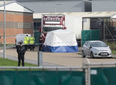 olice officers work at the scene where 39 bodies were found in a shipping container at Waterglade Industrial Park in Essex, Britain